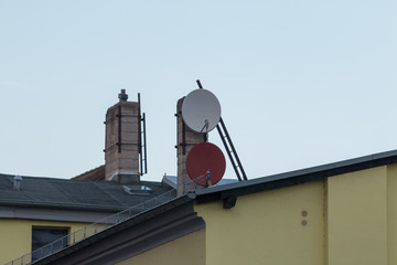 Satellite dishes on house roof