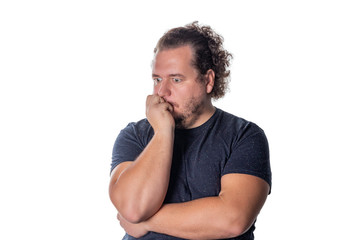 Portrait of sad thoughtful man isolated over white background. Looking aside.
