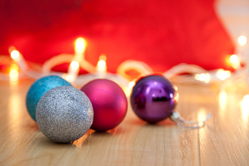 Four colorful baubles with copy space