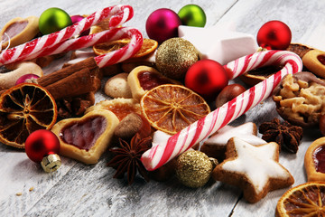 Decoration with christmas cookies. Typical cinnamon stars with fruits and nuts