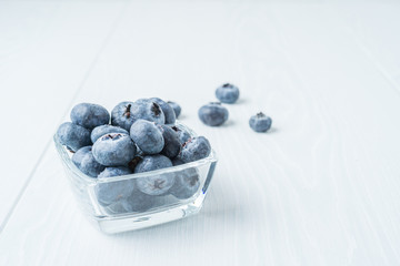 Blueberries in a glass cup closeup