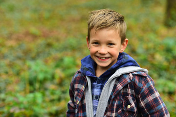 I never get tired of smiling. Little boy happy smiling outdoor. Happy little boy. Smiling child. Be positive and keep smiling