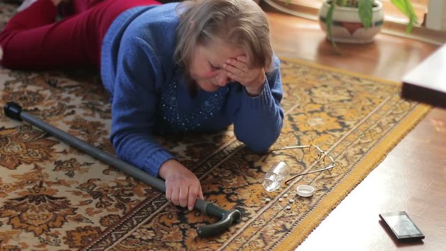Attack. Elderly woman fell to the floor and feels bad at home