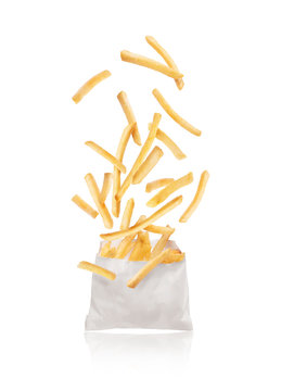 French fries falling into packaging Stock Photo by ©przemekklos 9353089