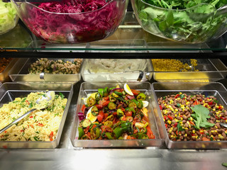 Salad Bar with Assortment of ingredients in Restaurant Healthy Food