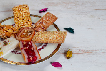 Halawet Al Mawlid - Collection of Beans Candies and Sweets on wooden table