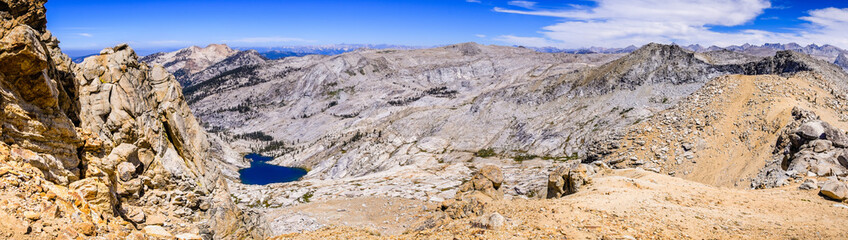 Panoramic landscape of the Sierra Nevada mountains as seen from Alta Peak in Sequoia National Park; Pear Lake visible in the valley; California
