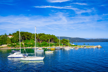 Wonderful romantic summer in old town at Adriatic sea. Summer panoramic coastline landscape. Boats and yachts in harbor. Krk. Krk island. Croatia. Europe.