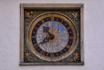 Fototapeta na wymiar Vintage wooden square clock on white wall