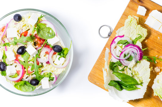 Diverse salad preparations. Vegetable salad and tofu cheese.