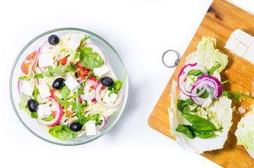 Preparation of vegetable salad. Salad and board for slicing.