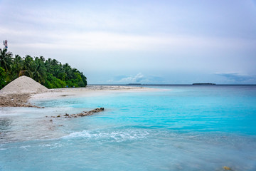 Fototapeta premium Stunning tropical beach with white sand in the Maldives. a great place to dive into meditation and Nirvana