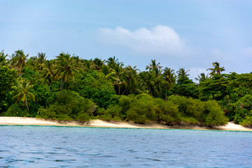 Stunning tropical beach with white sand in the Maldives. a great place to dive into meditation and Nirvana