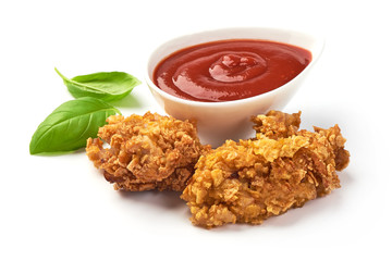 Deep Fried Breaded Chicken Fillet (drumsticks) with tomato sauce, isolated on white background. Close-up.