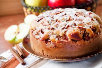 Homemade apple pie with cinnamon on the plate