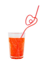 the red juice in the misted over glass with drinking straw isolated on white background