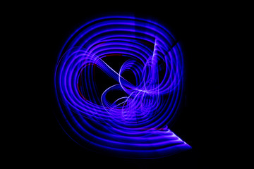 Colorful Light Painting Neon Motion effect.  Using a light up flashing kids sword with a long exposure at night.