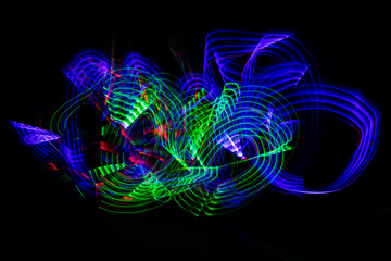 Colorful Light Painting Neon Motion effect.  Using a light up flashing kids sword with a long exposure at night.