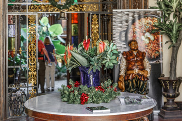 Decorated vase placed on the table at the entrance of a museum