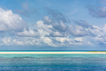 Stunning tropical beach with white sand in the Maldives. a great place to dive into meditation and Nirvana