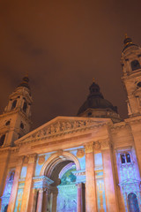 Obraz premium Christmas light show on St. Stephen's Basilica building in Budapest on January 1, 2018.