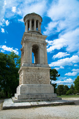 Fototapeta na wymiar The Mausoleum on the ancient Roman archaelogical site of Glanum near the town of St Remy de Provence, France