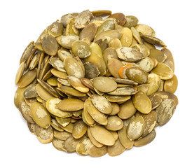 Handful of pumpkin seeds without shell, close up, isolated on white background