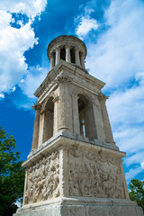 Fototapeta na wymiar The Mausoleum on the ancient Roman archaelogical site of Glanum near the town of St Remy de Provence, France