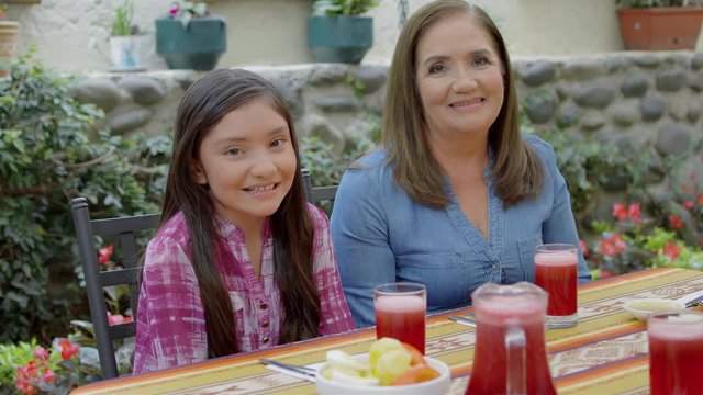 Hispanic family eating traditional meal together
