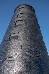 Old black brick mill