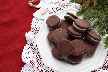 Biscuit chocolate chip cookies with cream cheese filling.