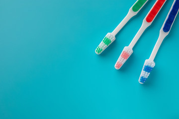 Toothbrushes on blue background