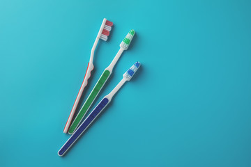 Toothbrushes on blue background