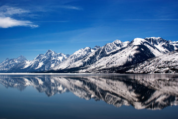 Scenic view of sea against snowcapped mountains © Cavan for Adobe
