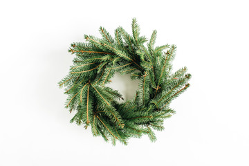 Christmas, New Year wreath frame made of fir branches on white background. Flat lay, top view blog hero header.