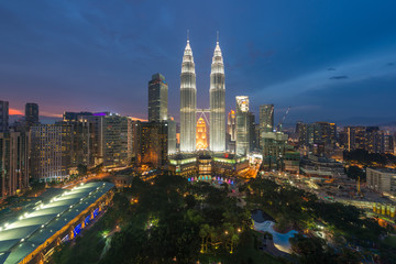 Naklejka na ściany i meble Kuala Lumpur skyline and skyscraper at night in Kuala Lumpur, Malaysia.