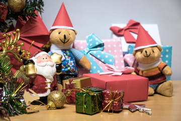 Lovely Couple bear and ornament, Christmas decorate at Merry Christmas and happy new year night light. Christmas tree and other decoration with Lovely gift and ribbon .