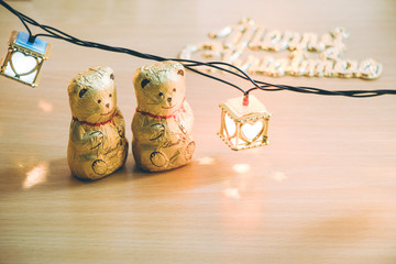 Lovely Couple bear and ornament, Christmas decorate at Merry Christmas and happy new year night light. Christmas tree and other decoration with Lovely gift and ribbon .