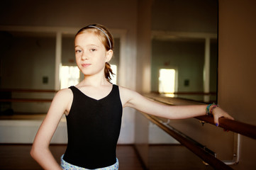 Portrait of confident girl in dance studio © Cavan for Adobe
