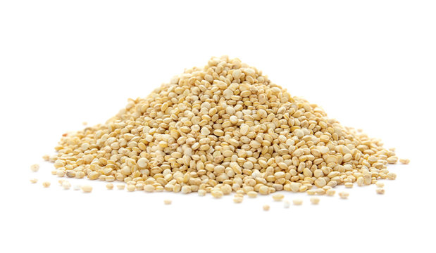 Pile of raw quinoa on white background