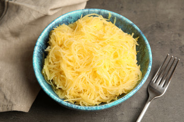 Cooked spaghetti squash in bowl on table
