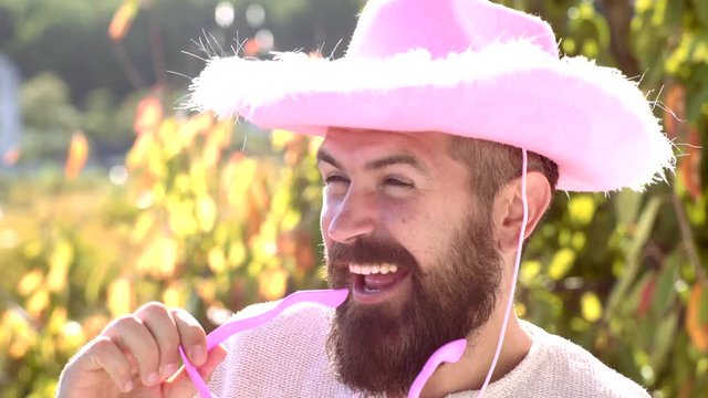 Close-up portrait of surprised and funny man. Bearded crazy man looking at the camera. Funny face.
