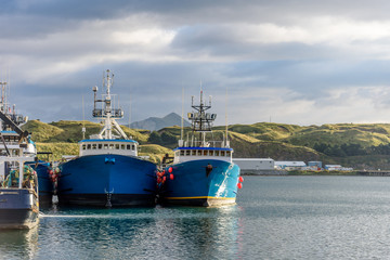 A Front Bow View of Alaskan Fishing Crab Boats at Port in Dutch Harbor Alaska