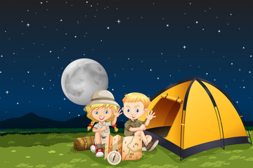 Children camping at night