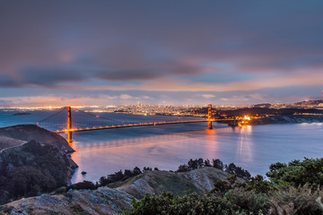 Night view of Golden Gate Bridge connecting San Francisco and Marin Headlands; California