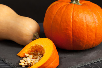 Butternut squash and orange pumpkin with seeds.