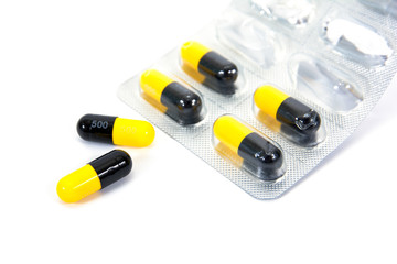 Amoxicillin capsules in unpack package isolated on white background. Amoxicillin capsules medicine 500 mg unpack isolated