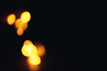 Defocused gold abstract christmas background. Bokeh. a little bit in corner