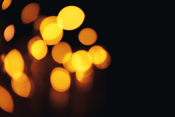 Defocused gold abstract christmas background. Bokeh. a little bit in corner