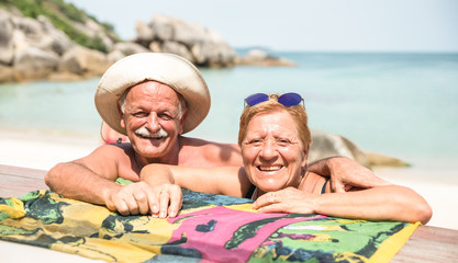Senior couple vacationer having genuine fun on Koh Samui tropical beach in Thailand - Excursion...